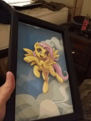 Size: 480x640 | Tagged: safe, artist:kp-shadowsquirrel, character:fluttershy, species:human, species:pegasus, species:pony, animated, bedroom, cloud, cutout, female, flying, happy, irl, irl human, no sound, photo, reflection, shadow, shadowbox, webm