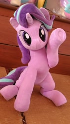 Size: 675x1200 | Tagged: safe, artist:nekokevin, character:starlight glimmer, species:pony, species:unicorn, series:nekokevin's glimmy, cute, female, glimmerbetes, irl, looking at you, mare, photo, plushie, raised hoof, sitting, smiling, solo, sweet dreams fuel, underhoof, waving