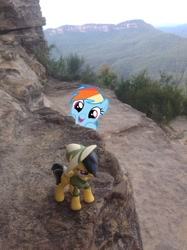 Size: 1024x1371 | Tagged: safe, artist:didgereethebrony, character:daring do, character:rainbow dash, blue mountains, cliff, cute, dashabetes, fangirl, figure, figurine, happy, irl, katoomba, mlp in australia, obsessed, obsession, photo, photobomb, ponies around the world, ponies in real life, smiling, squee, toy, trail
