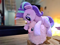 Size: 1024x768 | Tagged: safe, artist:nekokevin, character:starlight glimmer, oc, oc:fluffle puff, species:pony, species:unicorn, series:nekokevin's glimmy, female, fluffy, irl, looking down, mare, open mouth, photo, plushie, ponies riding ponies, size difference, smiling, tongue out