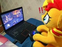 Size: 1024x768 | Tagged: safe, artist:nekokevin, character:sunset shimmer, species:pony, species:unicorn, computer, controller, exclamation point, female, irl, laptop computer, mare, monster hunter, monster hunter world, photo, plushie, sitting, smiling, solo