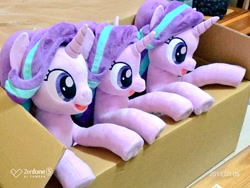 Size: 1024x768 | Tagged: safe, artist:nekokevin, character:starlight glimmer, species:pony, species:unicorn, series:nekokevin's glimmy, box, female, irl, mare, multeity, open mouth, photo, plushie, ponidox, pony in a box, raised hoof, self ponidox, sitting, smiling, starlight cluster, triality, trio, underhoof