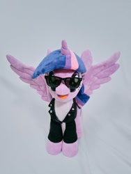 Size: 768x1024 | Tagged: safe, artist:nekokevin, character:twilight sparkle, character:twilight sparkle (alicorn), species:alicorn, species:pony, clothing, female, irl, jacket, looking at you, mare, open mouth, photo, plushie, simple background, smiling, solo, spread wings, sunglasses, white background, wings