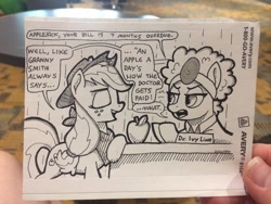 Size: 640x480 | Tagged: safe, artist:docwario, character:applejack, oc, species:earth pony, species:pony, apple, dialogue, doctor, female, food, head mirror, mare, monochrome, photo, sticker, traditional art