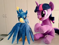Size: 1024x768 | Tagged: safe, artist:nekokevin, character:gallus, character:twilight sparkle, character:twilight sparkle (unicorn), species:griffon, species:pony, species:unicorn, cute, duo, female, irl, male, mare, open mouth, photo, plushie, sitting, smiling, spread wings, teenager, twiabetes, underhoof, wings