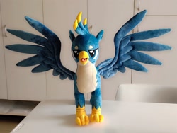 Size: 2048x1536 | Tagged: safe, artist:nekokevin, character:gallus, species:griffon, irl, lidded eyes, majestic, male, open mouth, photo, plushie, smiling, solo, spread wings, talons, teenager, wings