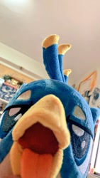 Size: 576x1024 | Tagged: safe, artist:nekokevin, character:gallus, species:griffon, beak, birb, close-up, cute, gallabetes, irl, lidded eyes, looking at you, male, maw, mawshot, open mouth, photo, plushie, solo, teenager, tongue out