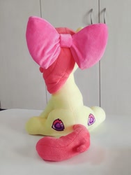 Size: 768x1024 | Tagged: safe, artist:nekokevin, character:apple bloom, species:earth pony, species:pony, both cutie marks, bow, female, filly, hair bow, irl, photo, plushie, rear view, sitting, solo