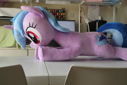Size: 5184x3456 | Tagged: safe, artist:nekokevin, character:sea swirl, species:pony, species:unicorn, g4, background pony, female, irl, lying down, mare, photo, plushie, prone, solo, table