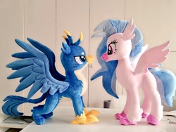 Size: 1024x768 | Tagged: safe, artist:nekokevin, character:gallus, character:silverstream, species:classical hippogriff, species:griffon, species:hippogriff, g4, duo, female, irl, lidded eyes, looking at each other, male, photo, plushie, size difference, smiling, spread wings, wings