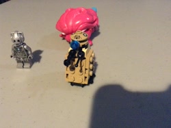 Size: 2592x1936 | Tagged: safe, artist:theanimefanz, character:pinkie pie, my little pony:equestria girls, cyberman, dalek, doctor who, doll, equestria girls minis, irl, lego, lego dimensions, passed out, photo, shadow, table, toy