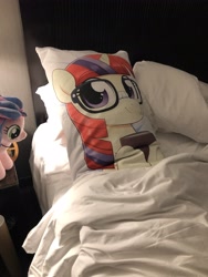 Size: 3024x4032 | Tagged: safe, artist:moozua, character:moondancer, oc, oc:bonita, species:pony, babscon, babscon 2019, babscon mascots, bed, body pillow, hotel room, irl, photo, plushie