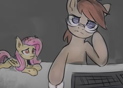 Size: 869x622 | Tagged: safe, artist:inowiseei, character:flutterbat, character:fluttershy, oc, species:bat pony, species:pony, bat ponified, colored pupils, computer, computer mouse, cute, dirty, ear tufts, frown, glare, glasses, gray background, injured, keyboard, leaning, lidded eyes, looking at you, looking up, messy mane, micro, no pupils, prone, race swap, sad, sadorable, shyabetes, simple background, trash