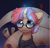 Size: 1625x1560 | Tagged: safe, artist:radioaxi, oc, oc only, oc:blue moon, species:pony, species:unicorn, :3, clothing, curved horn, eye clipping through hair, freckles, glasses, glowing horn, horn, looking at you, male, scroll, smiling, solo, stallion, sweater