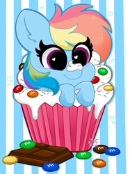 Size: 1535x2048 | Tagged: safe, artist:kittyrosie, character:rainbow dash, species:pegasus, species:pony, g4, chocolate, cupcake, cute, dashabetes, female, food, frosting, heart, heart eyes, m&m's, mare, ponies in food, solo, sprinkles, striped background, wholesome, wingding eyes