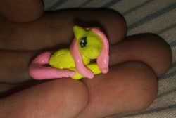 Size: 802x540 | Tagged: safe, artist:anxiouslilnerd, artist:oceanmoon-spirit, character:fluttershy, species:pegasus, species:pony, auction, craft, for sale, irl, photo, sculpture, solo, tiny, traditional art