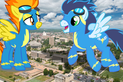 Size: 1000x667 | Tagged: safe, artist:jerryakira79, character:soarin', character:spitfire, species:pegasus, species:pony, clothing, female, giant pegasus, giant ponies in real life, giant pony, giant wonderbolts pony, giant/macro spitfire, irl, macro, male, mega giant, mega/giant soarin', photo, ponies in real life, uniform, wonderbolts uniform