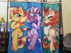 Size: 4032x3024 | Tagged: safe, artist:techycutie, character:autumn blaze, character:starlight glimmer, character:sunset shimmer, species:kirin, species:pony, species:unicorn, body pillow, body pillow design, bunset shimmer, butt, glimmer glutes, irl, looking at you, looking back, looking back at you, photo, plot, smiling