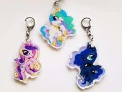 Size: 2048x1536 | Tagged: safe, artist:techycutie, character:princess cadance, character:princess celestia, character:princess luna, species:alicorn, species:pony, cute, keychain, photo