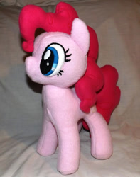 Size: 600x761 | Tagged: safe, artist:peruserofpieces, character:pinkie pie, species:earth pony, species:pony, female, irl, mare, missing cutie mark, photo, plushie, smiling, solo, standing
