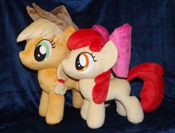 Size: 1280x974 | Tagged: safe, artist:peruserofpieces, character:apple bloom, character:applejack, species:earth pony, species:pony, accessory, bow, clothing, comparison, cowboy hat, duo, female, filly, happy, hat, irl, mare, photo, plushie, profile, siblings, side by side, sisters, smiling, toy