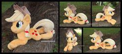 Size: 1338x597 | Tagged: safe, artist:peruserofpieces, character:applejack, species:earth pony, species:pony, accessory, beanie (plushie), clothing, cowboy hat, female, front view, happy, hat, irl, lying down, mare, photo, plushie, profile, prone, smiling, solo, sploot, toy