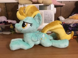 Size: 2048x1536 | Tagged: safe, artist:peruserofpieces, character:lightning dust, species:pegasus, species:pony, folded wings, irl, lidded eyes, photo, plushie, prone, wings