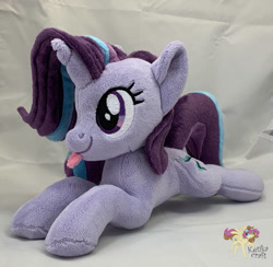 Size: 900x880 | Tagged: safe, artist:ketika, character:starlight glimmer, species:pony, species:unicorn, blep, female, irl, lying down, mare, photo, plushie, prone, silly, smiling, solo, tongue out