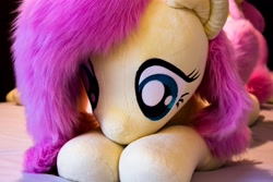 Size: 4096x2731 | Tagged: safe, artist:natureshy, artist:qtpony, character:fluttershy, species:pony, cute, cuteporn, eye, eyes, female, fluffy, front view, irl, life size, lying on bed, photo, plushie, prone, shyabetes, weapons-grade cute