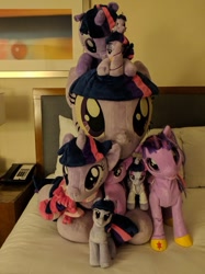 Size: 659x879 | Tagged: safe, artist:equinepalette, artist:flutterplushies, artist:klplushies, artist:plushwaifus, artist:shindeeru, official, photographer:corpulentbrony, character:twilight sparkle, character:twilight sparkle (alicorn), species:alicorn, species:pony, species:seapony (g4), bed, bronycon, bronycon 2017, hasbro, hotel, hotel room, irl, multeity, photo, plushie, pony pile, robotwi, seaponified, seapony twilight, sparkle sparkle sparkle, species swap, tower of pony, toy