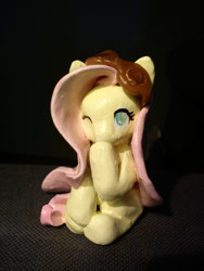 Size: 744x992 | Tagged: safe, artist:tt-n, character:fluttershy, covering mouth, goggles, irl, photo, sculpture, smiling, solo