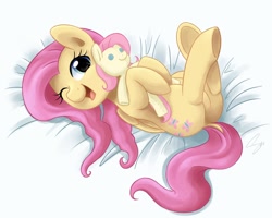Size: 3000x2400 | Tagged: safe, artist:steffy-beff, character:fluttershy, species:pegasus, species:pony, bed, cute, dock, female, hnnng, looking at you, mare, on back, plushie, shyabetes, solo, underhoof, wink
