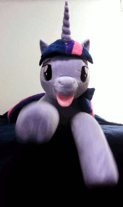 Size: 400x674 | Tagged: safe, artist:earthenhoof, artist:neysanight, character:twilight sparkle, character:twilight sparkle (alicorn), species:alicorn, species:pony, animated, bed, bedroom eyes, cute, female, hoofy-kicks, irl, loop, lying down, photo, plushie, solo, tongue out