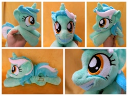 Size: 1600x1200 | Tagged: safe, artist:equinepalette, character:lyra heartstrings, species:pony, species:unicorn, beanie (plushie), female, hand, irl, irrational exuberance, mare, photo, plushie, prone, smiling, solo