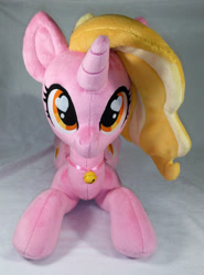 Size: 2454x3316 | Tagged: safe, artist:doctorkoda, character:luster dawn, species:pony, species:unicorn, female, heart eyes, irl, looking at you, lying down, mare, photo, plushie, prone, smiling, solo, wingding eyes