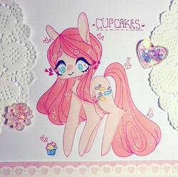 Size: 720x717 | Tagged: safe, artist:dollbunnie, character:pinkamena diane pie, character:pinkie pie, fanfic:cupcakes, cupcake, female, food, marker drawing, solo, traditional art