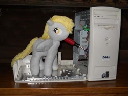 Size: 600x450 | Tagged: safe, artist:eratosofcyrene, character:derpy hooves, species:pegasus, species:pony, derpibooru, computer, derpy hooves tech support, doll, female, irl, mare, meta, photo, plushie, screwdriver, solo