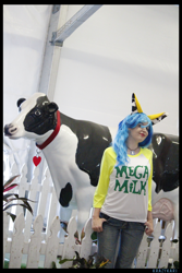 Size: 3456x5184 | Tagged: safe, artist:krazykari, oc, oc:milky way, species:cow, species:human, clothing, cosplay, costume, irl, irl human, mega milk, meme, photo, shirt, solo, statue, udder