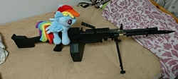 Size: 1440x646 | Tagged: safe, artist:omegapony16, character:rainbow dash, species:pegasus, species:pony, bayonet, bed, female, gun, irl, m249, mare, photo, plushie, toy, weapon