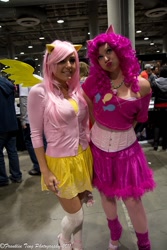 Size: 683x1024 | Tagged: safe, artist:aktrez, character:fluttershy, character:pinkie pie, species:human, comikaze expo, comikaze expo 2011, convention, cosplay, irl, irl human, jessica nigri, photo