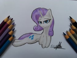 Size: 4128x3096 | Tagged: safe, artist:ironbeastz, character:rarity, species:pony, female, pencil, prone, solo, traditional art