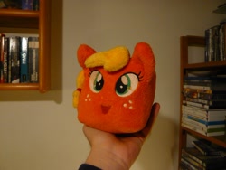 Size: 1536x1152 | Tagged: safe, artist:angel99percent, artist:ultrathehedgetoaster, character:applejack, species:pony, applecube, book, bookshelf, cube, cube plush, cube plushie, female, hand, irl, photo, plushie, pony cube, to be or not to be