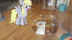 Size: 1967x1106 | Tagged: safe, artist:joeydr, derpibooru original, photographer:joeydr, character:derpy hooves, species:human, species:pegasus, species:pony, cute, derpabetes, eyes on the prize, female, food, hand, happy, irl, irl human, mare, muffin, offscreen character, open mouth, photo, ponies in real life, pov, smiling, solo focus, spread wings, wings