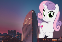 Size: 4189x2793 | Tagged: safe, artist:andoanimalia, artist:jerryakiraclassics19, character:sweetie belle, species:pony, species:unicorn, building, city, female, giant pony, giantess, highrise ponies, irl, looking at you, macro, mare, mega sweetie belle, older, older sweetie belle, photo, ponies in real life, scenery, skyline, smiling, sunset, tree