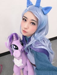 Size: 1202x1600 | Tagged: safe, artist:bunnyoxo, character:starlight glimmer, character:trixie, species:human, cape, clothing, convention:japanponycon, cosplay, costume, crown, horn, irl, irl human, jewelry, photo, plushie, pony ears, ponyfesta, regalia, trixie's cape