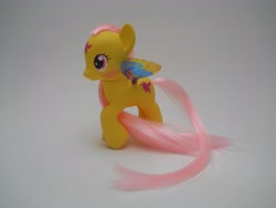 Size: 4320x3240 | Tagged: safe, artist:tiellanicole, species:pony, g1, custom, g1 to g4, generation leap, irl, little flitter, photo, solo, summer wing ponies, toy, winger pony