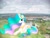 Size: 1024x768 | Tagged: safe, artist:mirrorcrescent, artist:princesslunayay, character:princess celestia, species:alicorn, species:pony, g4, britain, crown, england, female, giant alicorn, giant ponies in real life, giant pony, giantess, giantlestia, grass, hoof shoes, irl, jewelry, lying down, macro, mare, mega celestia, necklace, park, photo, ponies in real life, regalia, relaxing, smiling, solo, tree, united kingdom