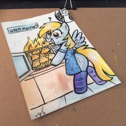 Size: 600x600 | Tagged: safe, artist:marybellamy, character:derpy hooves, species:pony, apron, bipedal, clothing, female, fire, food, grin, microwave, muffin, socks, solo, traditional art, watercolor painting