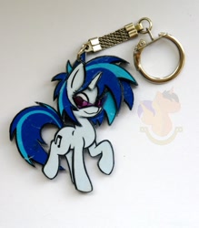 Size: 896x1024 | Tagged: safe, artist:king-franchesco, character:dj pon-3, character:vinyl scratch, species:pony, species:unicorn, cutie mark, female, hooves, horn, irl, keychain, mare, photo, raised hoof, solo, sunglasses