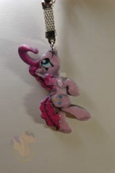 Size: 1024x1539 | Tagged: safe, artist:king-franchesco, character:pinkie pie, species:earth pony, species:pony, cutie mark, female, hooves, irl, keychain, mare, mouth hold, photo, solo